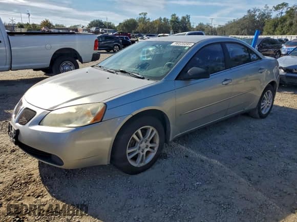 ✅ 2006 Pontiac G6 6-Cyl • VIN: 1G2ZG558764226007 • Lot: 96535095. Listed on Copart with Not provided. Free auction sales archive from the USA and detailed vehicle history report at DreamBid. Image 1.