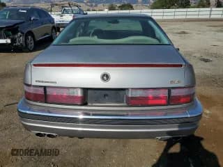 ✅ 1997 Cadillac Seville SLS • VIN: 1G6KS52Y0VU801906 • Lot: 65169364. Wystawiony na Copart z przebiegiem 191 627 mil. Bezpłatny archiwum sprzedaży aukcyjnych z USA i szczegółowy raport historii pojazdu na DreamBid. Zdjęcie 6.