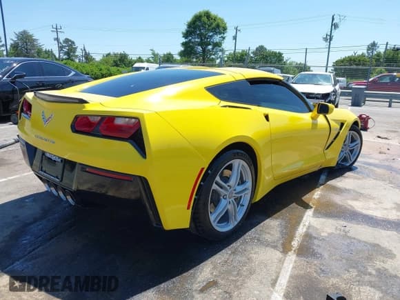 ✅ 2016 Chevrolet Corvette 1LT • VIN: 1G1YB2D77G5111974 • Lot: 42134341. Listed on IAAI with 28,287 mi. Free auction sales archive from the USA and detailed vehicle history report at DreamBid. Image 4.