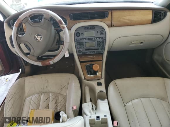 ✅ 2003 Jaguar X-Type 2.5L Manual • VIN: SAJEA51D23XD32376 • Лот: 71879205. Опубликован ранее на Copart с пробегом Не указан. Бесплатный доступ к архиву аукционных продаж из США и подробный отчёт об истории автомобиля на DreamBid. Изображение 8.
