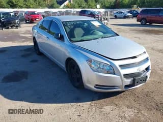 ✅ 2012 Chevrolet Malibu 1LS • VIN: 1G1ZB5E05CF240002 • Lot: 43385460. Listed on IAAI with 151,059 mi. Free auction sales archive from the USA and detailed vehicle history report at DreamBid. Image 1.