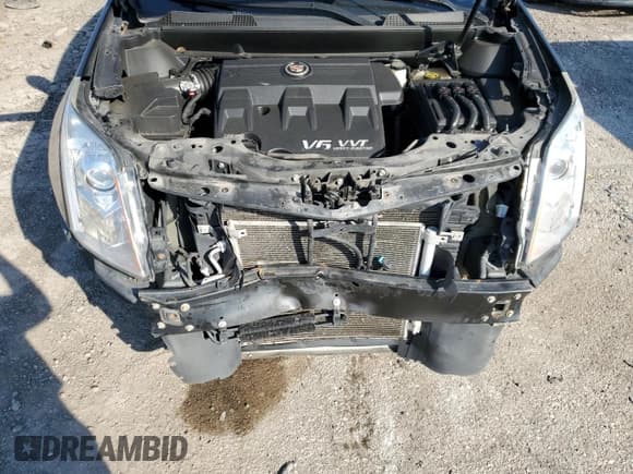 ✅ 2015 Cadillac SRX Performance Collection • VIN: 3GYFNFE33FS629992 • Lot: 82061395. Listed on Copart with 111,944 mi. Free auction sales archive from the USA and detailed vehicle history report at DreamBid. Image 12.