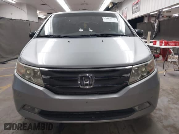 ✅ 2012 Honda Odyssey Touring • VIN: 5FNRL5H90CB004537 • Lot: 43184321. Listed on IAAI with 132,469 mi. Free auction sales archive from the USA and detailed vehicle history report at DreamBid. Image 12.