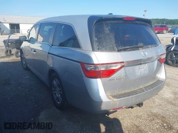 ✅ 2011 Honda Odyssey EX-L • VIN: 5FNRL5H6XBB057590 • Lot: 42481395. Listed on IAAI with 206,000 mi. Free auction sales archive from the USA and detailed vehicle history report at DreamBid. Image 3.