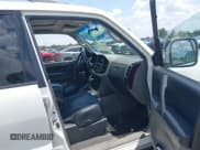 ✅ 2002 Mitsubishi Montero Limited • VIN: JA4MW51R82J060397 • Lot: 42343483. Listed on IAAI with 148,058 mi. Free auction sales archive from the USA and detailed vehicle history report at DreamBid. Image 5.