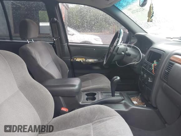 ✅ 1999 Jeep Grand Cherokee Laredo • VIN: 1J4G258SXXC518647 • Лот: 42124724. Опубликован ранее на IAAI с пробегом 229 668 миль. Бесплатный доступ к архиву аукционных продаж из США и подробный отчёт об истории автомобиля на DreamBid. Изображение 5.