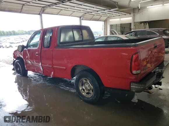 ✅ 1997 Ford F-150 XL • VIN: 1FTEX17L2VNB81619 • Lot: 68626805. Listed on Copart with 198,610 mi. Free auction sales archive from the USA and detailed vehicle history report at DreamBid. Image 2.