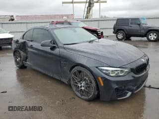 ✅ 2020 BMW M4 • VIN: WBS4Z9C02LEJ63966 • Лот: 43931033. Опубликован ранее на Copart с пробегом 21 079 миль. Бесплатный доступ к архиву аукционных продаж из США и подробный отчёт об истории автомобиля на DreamBid. Изображение 4.