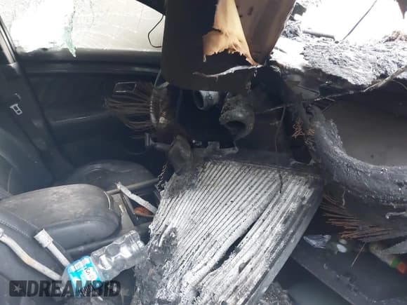 ✅ 2015 Ford Taurus SHO • VIN: 1FAHP2KT2FG186714 • Lot: 42182632. Listed on IAAI with 113,500 mi. Free auction sales archive from the USA and detailed vehicle history report at DreamBid. Image 14.