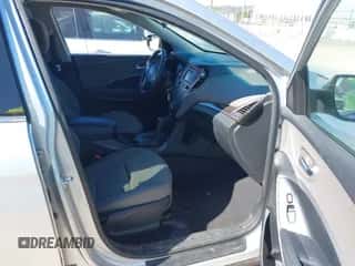 2018 Hyundai Santa Fe 2.4L z VIN 5XYZT3LB5JG563330, wystawiony jako IAAI lot #43397944 z przebiegiem 124 663 mil mil oraz . Historia ofert i sprzedaży dostępna na DreamBid. Obrazek 5.