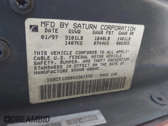 ✅ 1997 Saturn SC • VIN: 1G8ZF1280VZ261592 • Lot: 43468001. Listed on IAAI with 220,986 mi. Free auction sales archive from the USA and detailed vehicle history report at DreamBid. Image 9.