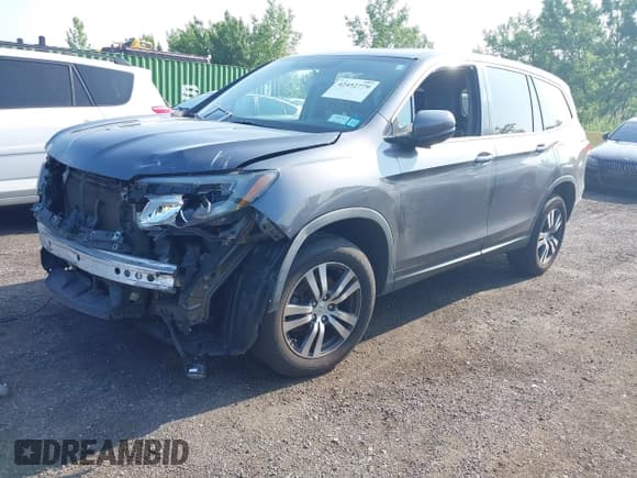 ✅ 2017 Honda Pilot EX-L • VIN: 5FNYF6H5XHB093028 • Lot: 42452779. Listed on IAAI with 134,559 mi. Free auction sales archive from the USA and detailed vehicle history report at DreamBid. Image 18.