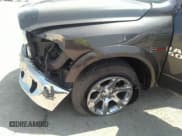 ✅ 2015 Ram 1500 Laramie • VIN: 1C6RR6NM0FS590636 • Lot: 37320388. Wystawiony na IAAI z przebiegiem 93 163 mil. Bezpłatny archiwum sprzedaży aukcyjnych z USA i szczegółowy raport historii pojazdu na DreamBid. Zdjęcie 6.