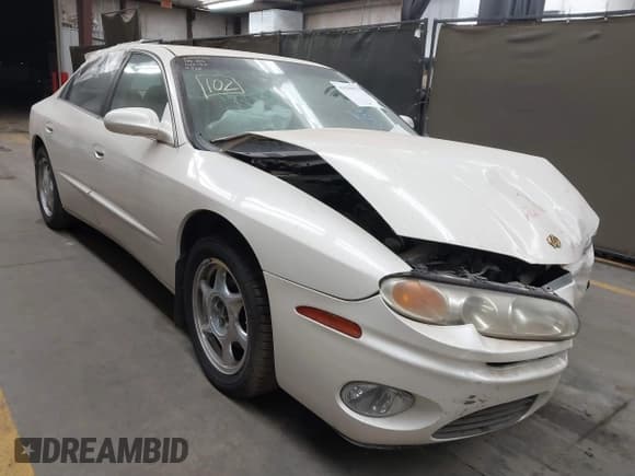 ✅ 2002 Oldsmobile Aurora • VIN: 1G3GS64CX24130928 • Lot: 41626970. Listed on IAAI with 154,816 mi. Free auction sales archive from the USA and detailed vehicle history report at DreamBid. Image 1.