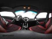 ✅ 2012 Hyundai Veloster w/Gray Int • VIN: KMHTC6AD0CU080630 • Lot: 42191015. Wystawiony na IAAI z przebiegiem 48 405 mil. Bezpłatny archiwum sprzedaży aukcyjnych z USA i szczegółowy raport historii pojazdu na DreamBid. Zdjęcie 18.