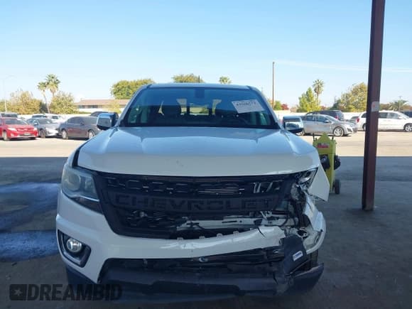 ✅ 2018 Chevrolet Colorado 2WD LT • VIN: 1GCGSCEA4J1147493 • Лот: 43566572. Опубликован ранее на IAAI с пробегом 79 533 миль. Бесплатный доступ к архиву аукционных продаж из США и подробный отчёт об истории автомобиля на DreamBid. Изображение 13.