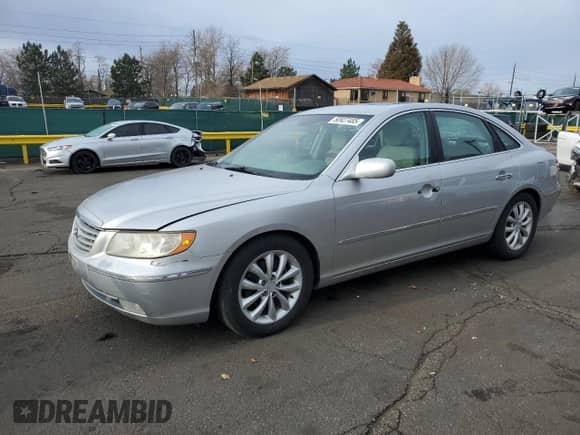 2006 Hyundai Azera SE z VIN KMHFC46F36A087430, wystawiony jako Copart lot #50927485 z przebiegiem 102 868 mil mil oraz Szkoda całkowita • Salvage title. Historia ofert i sprzedaży dostępna na DreamBid. Obrazek 1.