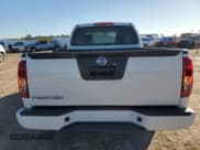 ✅ 2021 Nissan Frontier S • VIN: 1N6ED0CE8MN717981 • Лот: 43574225. Опубликован ранее на Copart с пробегом 53 411 миль. Бесплатный доступ к архиву аукционных продаж из США и подробный отчёт об истории автомобиля на DreamBid. Изображение 6.