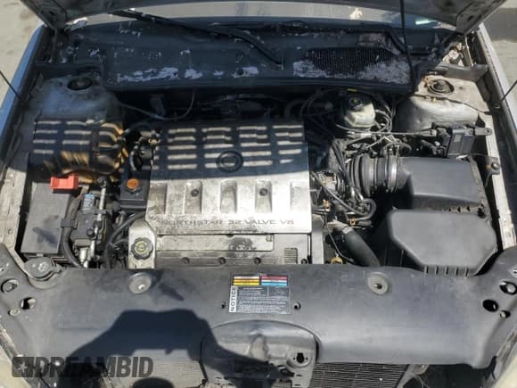 ✅ 2002 Cadillac DeVille • VIN: 1G6KD54Y92U117486 • Lot: 53924295. Listed on Copart with 170,123 mi. Free auction sales archive from the USA and detailed vehicle history report at DreamBid. Image 11.