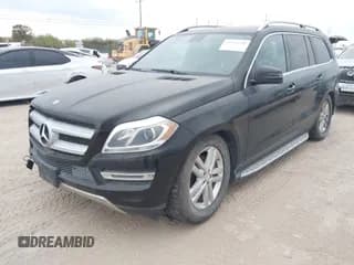 ✅ 2014 Mercedes-Benz GL 450 • VIN: 4JGDF7CE7EA376935 • Lot: 43771291. Listed on IAAI with 128,601 mi. Free auction sales archive from the USA and detailed vehicle history report at DreamBid. Image 2.