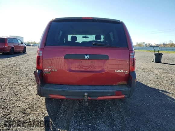 2009 Dodge Grand Caravan SE with VIN 2D8HN44E79R537938, listed as a Copart auction lot 90581805 with 162,506 mi miles and Salvage title. Bid and sale history available at DreamBid. Image 6.