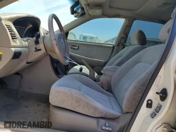 ✅ 2004 Kia Optima LX • VIN: KNAGD128445308824 • Lot: 62962595. Wystawiony na Copart z przebiegiem 135 448 mil. Bezpłatny archiwum sprzedaży aukcyjnych z USA i szczegółowy raport historii pojazdu na DreamBid. Zdjęcie 7.