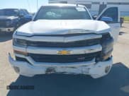 ✅ 2016 Chevrolet Silverado 1500 LT • VIN: 3GCUKREC3GG143985 • Лот: 43594584. Опубликован ранее на IAAI с пробегом 209 894 миль. Бесплатный доступ к архиву аукционных продаж из США и подробный отчёт об истории автомобиля на DreamBid. Изображение 6.