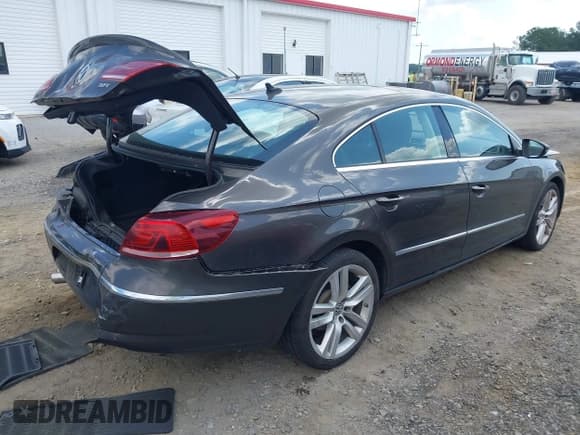 ✅ 2015 Volkswagen CC Executive • VIN: WVWRP7AN7FE802238 • Lot: 42321727. Wystawiony na IAAI z przebiegiem 65 933 mil. Bezpłatny archiwum sprzedaży aukcyjnych z USA i szczegółowy raport historii pojazdu na DreamBid. Zdjęcie 4.