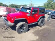 ✅ 2016 Jeep Wrangler Willys Wheeler • VIN: 1C4AJWAG0GL314708 • Lot: 43171506. Listed on IAAI with 52,574 mi. Free auction sales archive from the USA and detailed vehicle history report at DreamBid. Image 2.