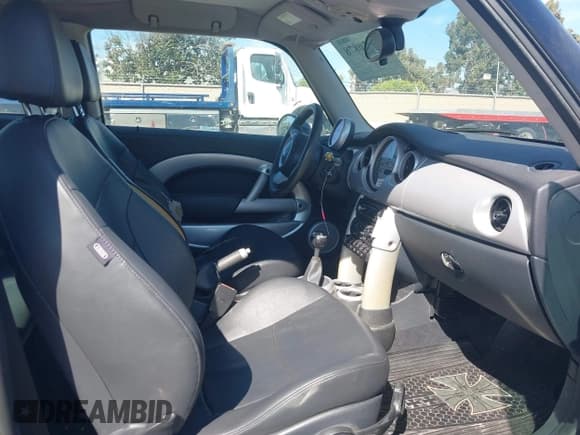 ✅ 2006 MINI Hardtop • VIN: WMWRC33576TK94086 • Лот: 42850878. Опубликован ранее на IAAI с пробегом 138 513 миль. Бесплатный доступ к архиву аукционных продаж из США и подробный отчёт об истории автомобиля на DreamBid. Изображение 5.