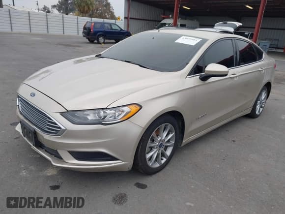 ✅ 2017 Ford Fusion Hybrid SE • VIN: 3FA6P0LU7HR381397 • Lot: 43879951. Listed on IAAI with 206,951 mi. Free auction sales archive from the USA and detailed vehicle history report at DreamBid. Image 17.