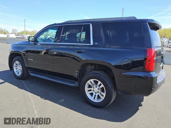 ✅ 2018 Chevrolet Tahoe LT • VIN: 1GNSKBKC7JR109128 • Lot: 52640365. Listed on Copart with 92,883 mi. Free auction sales archive from the USA and detailed vehicle history report at DreamBid. Image 2.
