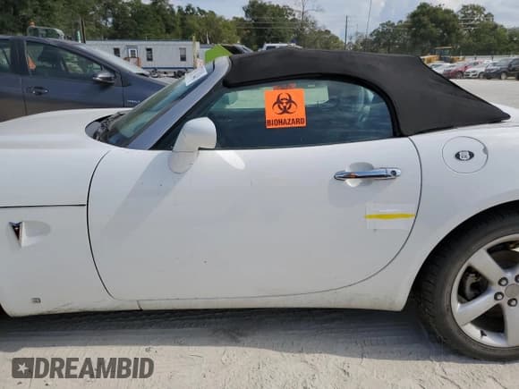✅ 2006 Pontiac Solstice • VIN: 1G2MB35B46Y117327 • Lot: 77982244. Wystawiony na Copart z przebiegiem 128 089 mil. Bezpłatny archiwum sprzedaży aukcyjnych z USA i szczegółowy raport historii pojazdu na DreamBid. Zdjęcie 12.