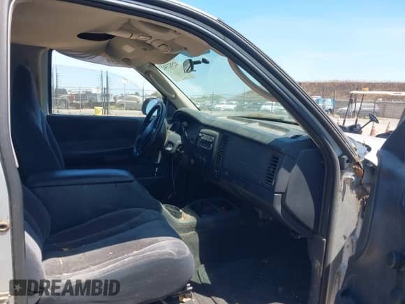 2002 Dodge Dakota SLT with VIN 1B7GG42N32S634050, listed as a IAAI auction lot 42582142 with Not provided miles and . Bid and sale history available at DreamBid. Image 5.