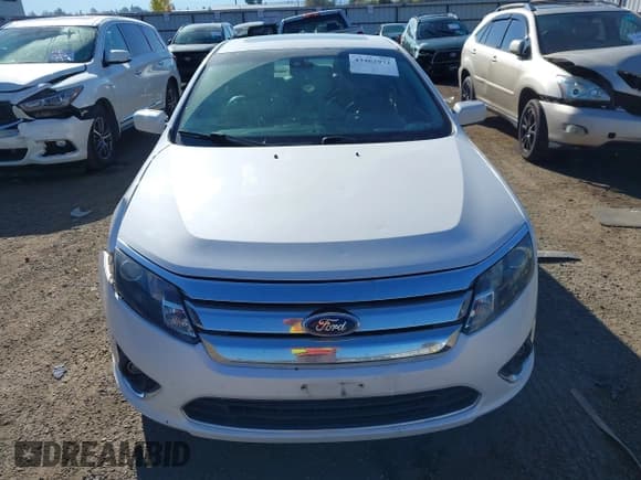 ✅ 2012 Ford Fusion Hybrid • VIN: 3FADP0L36CR414428 • Lot: 43462972. Listed on IAAI with 198,121 mi. Free auction sales archive from the USA and detailed vehicle history report at DreamBid. Image 12.