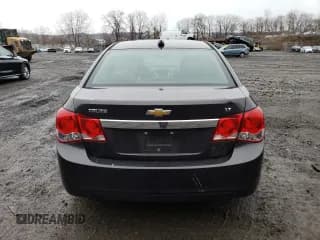 ✅ 2015 Chevrolet Cruze LT • VIN: 1G1PC5SBXF7112797 • Lot: 42101493. Listed on Copart with 141,471 mi. Free auction sales archive from the USA and detailed vehicle history report at DreamBid. Image 6.