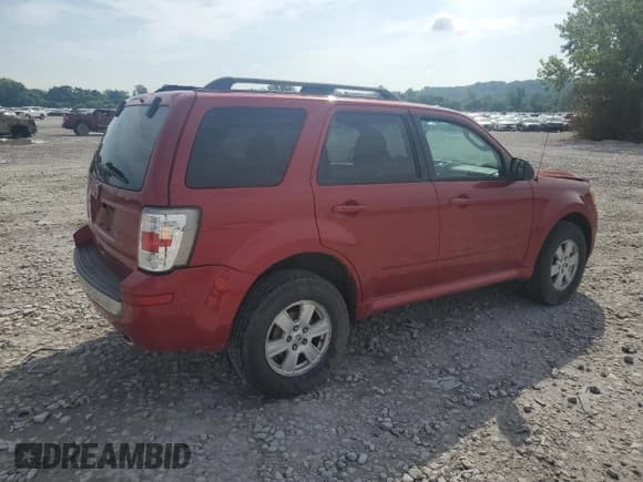 ✅ 2010 Mercury Mariner • VIN: 4M2CN9B71AKJ05093 • Лот: 66484105. Опубликован ранее на Copart с пробегом Не указан. Бесплатный доступ к архиву аукционных продаж из США и подробный отчёт об истории автомобиля на DreamBid. Изображение 3.