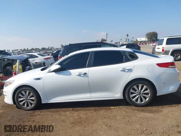 ✅ 2018 Kia Optima LX • VIN: 5XXGT4L35JG265399 • Lot: 43785035. Listed on IAAI with 128,699 mi. Free auction sales archive from the USA and detailed vehicle history report at DreamBid. Image 14.