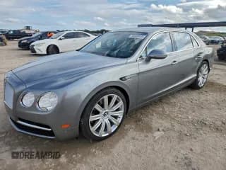 ✅ 2014 Bentley Flying Spur • VIN: SCBEC9ZAXEC088187 • Lot: 95693445. Listed on Copart with 47,445 mi. Free auction sales archive from the USA and detailed vehicle history report at DreamBid. Image 1.