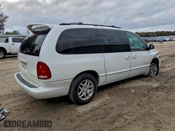 ✅ 1999 Dodge Caravan SE • VIN: 1B4GP44G1XB607352 • Lot: 94891865. Listed on Copart with 83,023 mi. Free auction sales archive from the USA and detailed vehicle history report at DreamBid. Image 3.