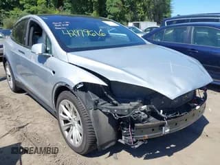 ✅ 2016 Tesla Model X P90D • VIN: 5YJXCBE4XGF030048 • Lot: 42979616. Listed on IAAI with 97,943 mi. Free auction sales archive from the USA and detailed vehicle history report at DreamBid. Image 1.