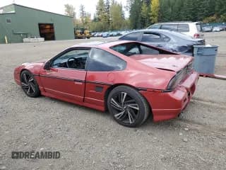 ✅ 1987 Pontiac Fiero GT • VIN: 1G2PG1199HP214795 • Lot: 75901054. Wystawiony na Copart z przebiegiem 206 675 mil. Bezpłatny archiwum sprzedaży aukcyjnych z USA i szczegółowy raport historii pojazdu na DreamBid. Zdjęcie 2.