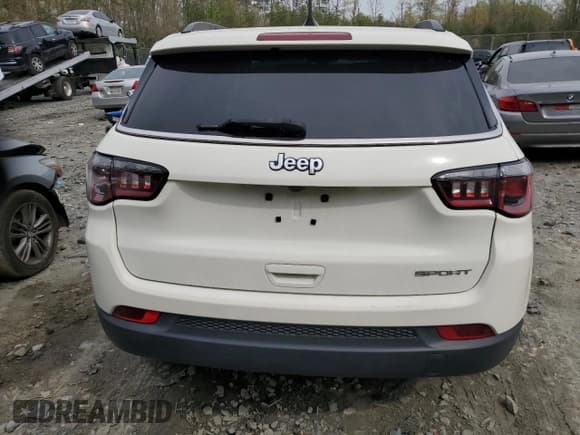 ✅ 2020 Jeep Compass Sport • VIN: 3C4NJCAB6LT169421 • Лот: 51906545. Опубликован ранее на Copart с пробегом 60 263 миль. Бесплатный доступ к архиву аукционных продаж из США и подробный отчёт об истории автомобиля на DreamBid. Изображение 6.