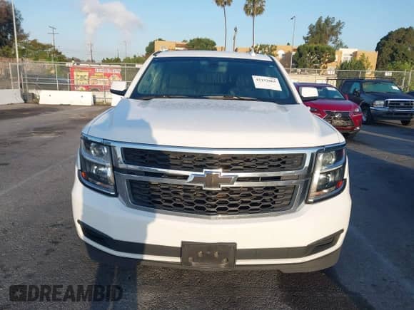 2018 Chevrolet Suburban LS z VIN 1GNSKGKC5JR173889, wystawiony jako IAAI lot #42152865 z przebiegiem 73 358 mil mil oraz . Historia ofert i sprzedaży dostępna na DreamBid. Obrazek 12.