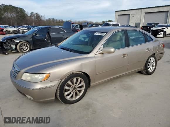 2006 Hyundai Azera SE с VIN KMHFC46F86A109521, выставлен на аукционе Copart как лот 42508805 с пробегом 215 583 миль миль и Списание • Salvage title. История ставок и продаж доступна на DreamBid. Изображение 1.