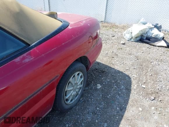 ✅ 1996 Chrysler Sebring JX • VIN: 3C3EL45H8TT306636 • Lot: 42359845. Listed on IAAI with 170,403 mi. Free auction sales archive from the USA and detailed vehicle history report at DreamBid. Image 14.