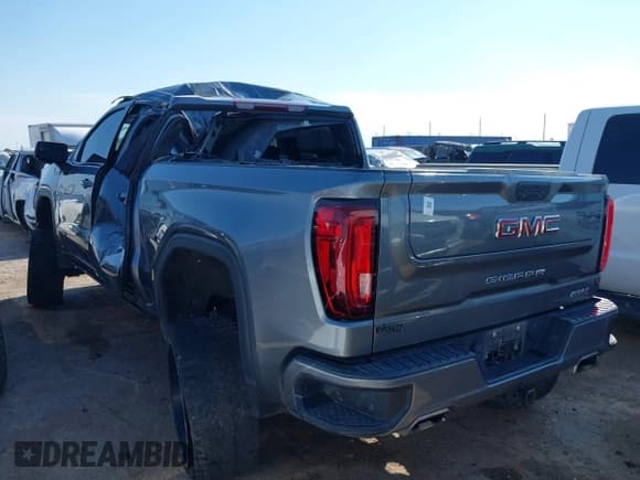 ✅ 2021 GMC Sierra 1500 AT4 • VIN: 3GTP9EEL9MG471988 • Лот: 43135351. Опубликован ранее на IAAI с пробегом 65 633 миль. Бесплатный доступ к архиву аукционных продаж из США и подробный отчёт об истории автомобиля на DreamBid. Изображение 3.