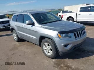 ✅ 2015 Jeep Grand Cherokee Laredo • VIN: 1C4RJFAG3FC103679 • Lot: 43105451. Listed on IAAI with 202,415 mi. Free auction sales archive from the USA and detailed vehicle history report at DreamBid. Image 1.