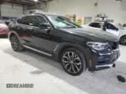 ✅ 2021 BMW X4 xDrive30i • VIN: 5UX2V1C02M9F43235 • Lot: 92528985. Listed on Copart with 38,569 mi. Free auction sales archive from the USA and detailed vehicle history report at DreamBid. Image 4.