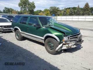 ✅ 1997 Chevrolet Blazer LS • VIN: 1GNDT13W2V2113031 • Lot: 80850575. Wystawiony na Copart z przebiegiem 158 759 mil. Bezpłatny archiwum sprzedaży aukcyjnych z USA i szczegółowy raport historii pojazdu na DreamBid. Zdjęcie 4.